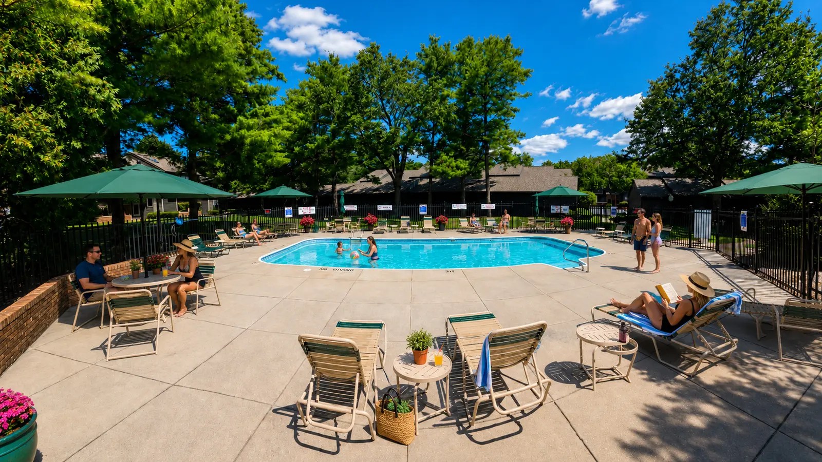 Heated swimming pool and landscaped patio at York Woods Center